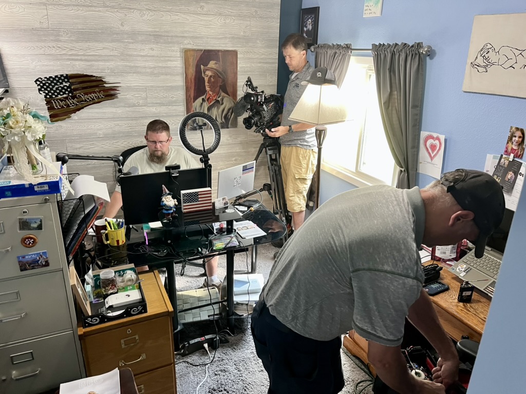 Photo of Wilk Wilkinson podcasting