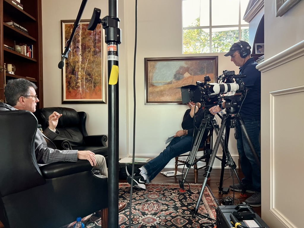 Photo of Tom Rosshirt being interviewed