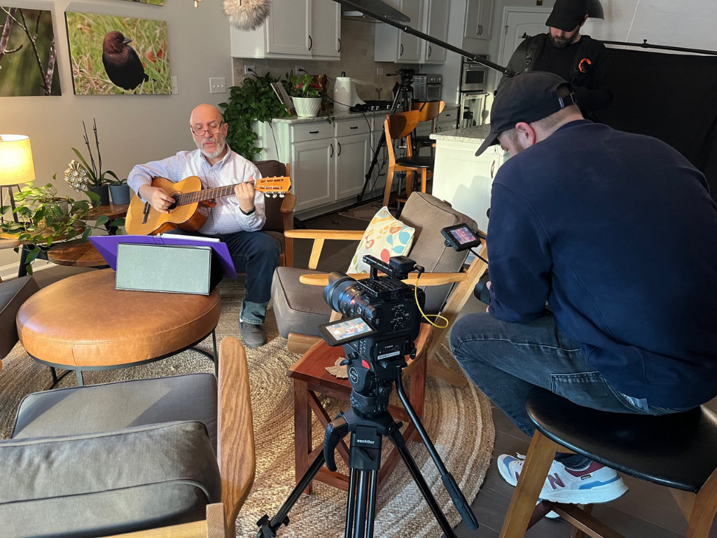 Photo of Bernardo Guzman playing guitar